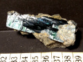 163b